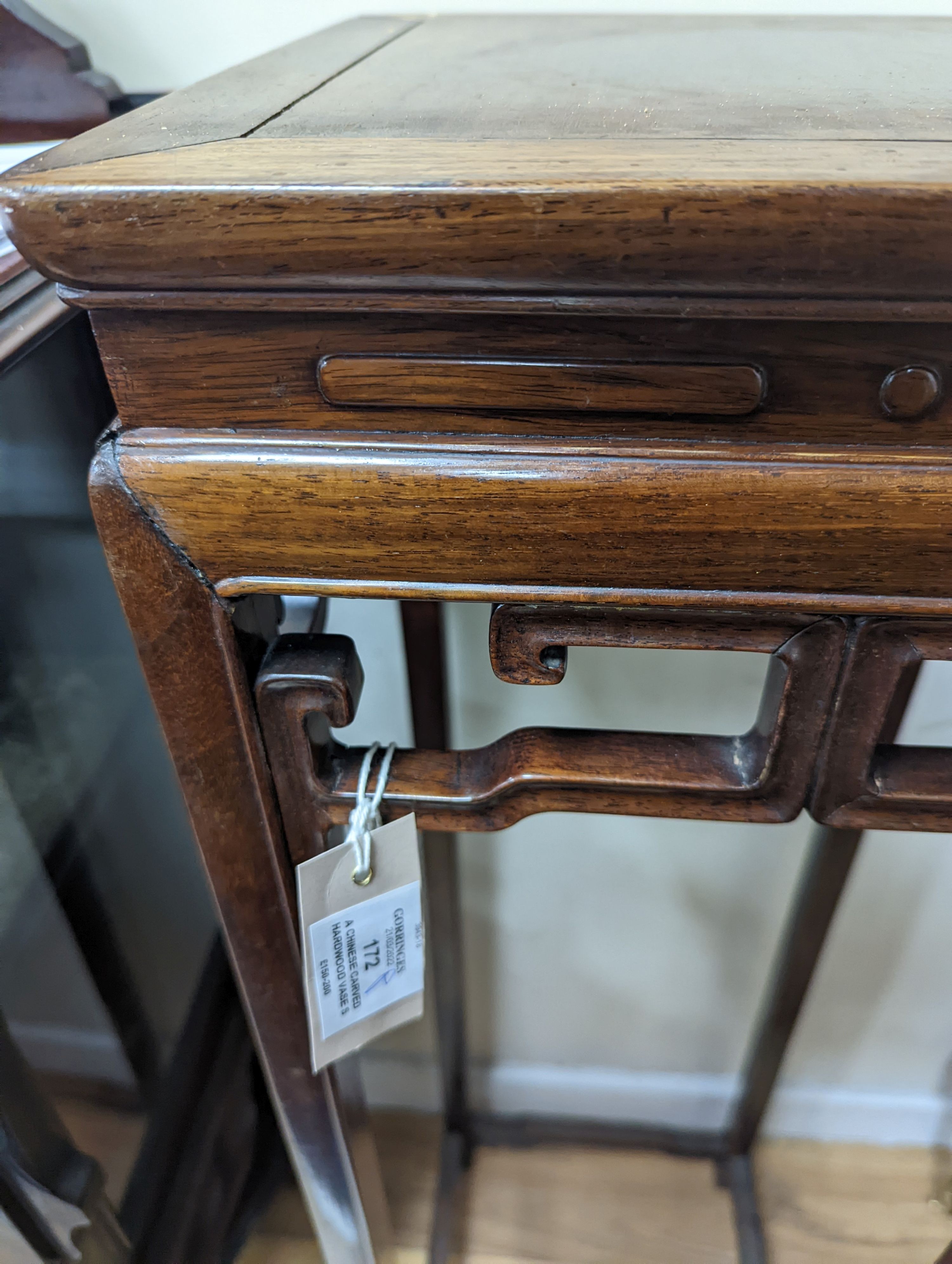 A Chinese carved hardwood vase stand, width 32cm, depth 33cm, height 110cm